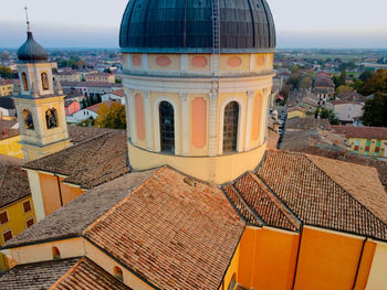 High angle view of buildings in city against sky