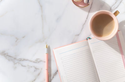 High angle view of coffee cup on table