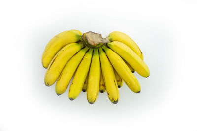 Close-up of bananas against white background