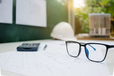 Close-up of eyeglasses on table