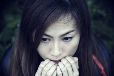 Close-up portrait of young woman