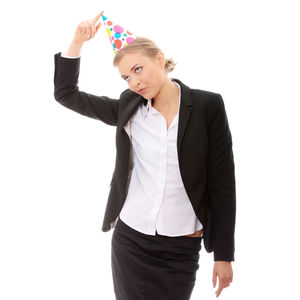 Mid adult woman standing against white background
