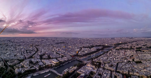 High angle view of city at sunset