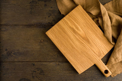 High angle view of bread on cutting board