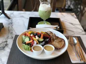 High angle view of food served on table