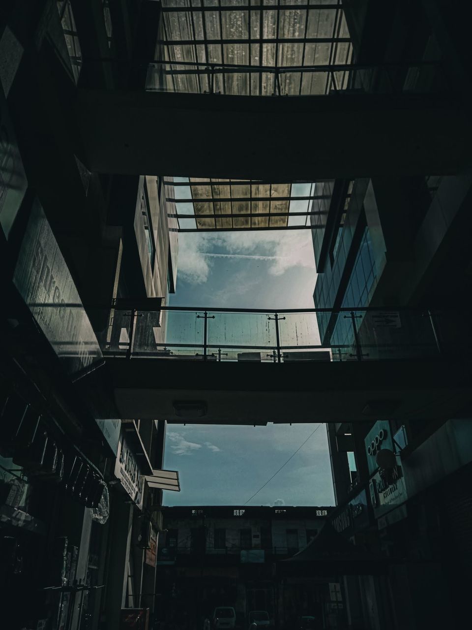 architecture, built structure, sky, cloud - sky, building exterior, low angle view, no people, day, building, modern, glass - material, nature, city, outdoors, transparent, reflection, skylight, sunlight, window, office building exterior, ceiling, directly below