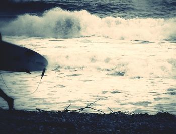 Waves splashing on shore