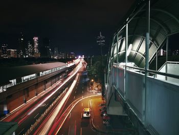 High angle view of light trails on road at night