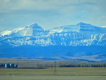 Scenic view of snow covered mountains