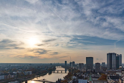 High angle view of buildings against sky during sunset