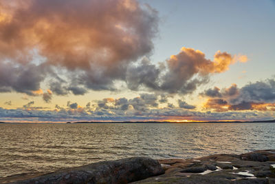 Scenic view of sea against sky during sunset