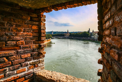 Italy ancient medieval walls on the adige river