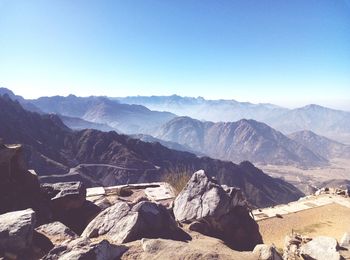 Scenic view of mountains against clear blue sky