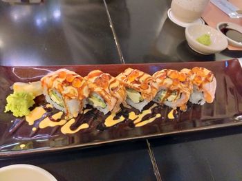 Close-up of sushi served on table