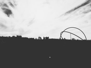 Low angle view of silhouette trees against sky at sunset