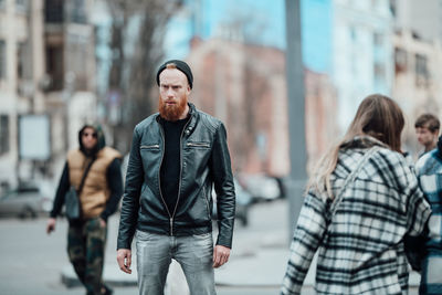 Young man on street in city