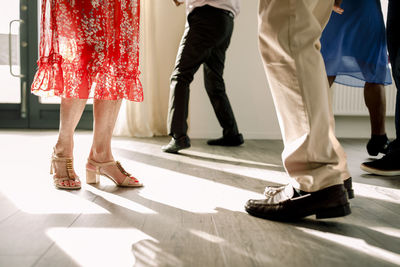 Low section senior men and women dancing in class