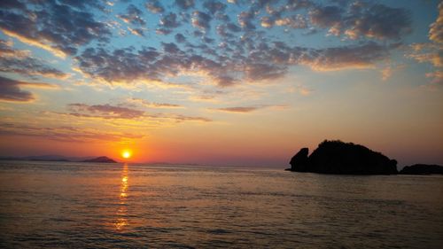 Scenic view of sea against sky during sunset