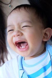 Close-up portrait of smiling boy