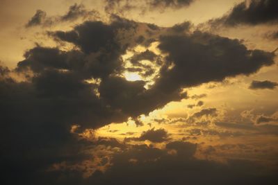 Low angle view of dramatic sky during sunset