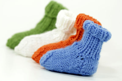 Close-up of multi colored object over white background