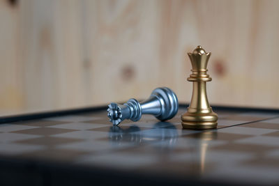 Close-up of chess pieces on board