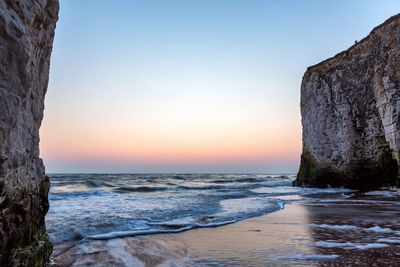 Scenic view of sea at sunset