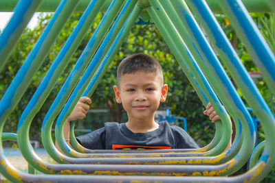 Portrait of smiling boy at playground