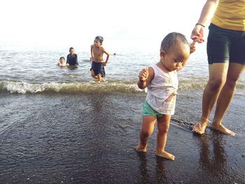 Boy playing in pool