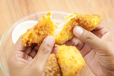 Close-up of man holding food