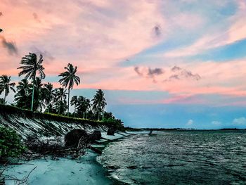 Scenic view of sea against sky at sunset