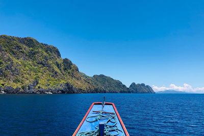 Scenic view of sea against blue sky