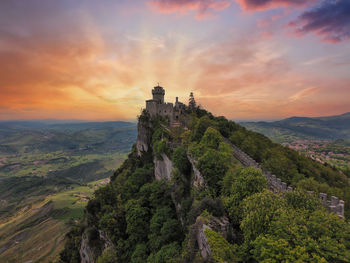 Scenic view of mountains against sky during sunset
