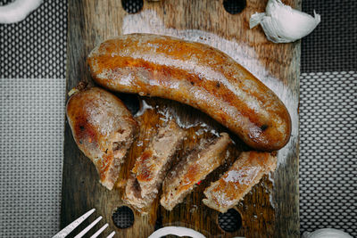 High angle view of meat on barbecue grill