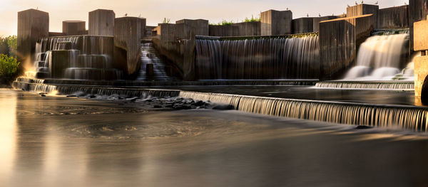 Scenic view of stepping stone falls at park