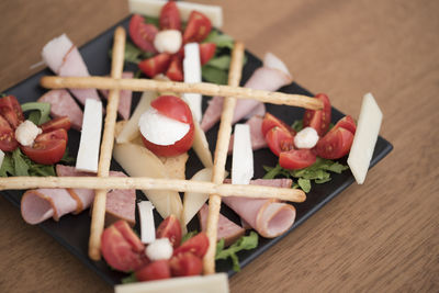 High angle view of chopped vegetables on cutting board