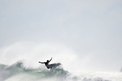 Man jumping in sky