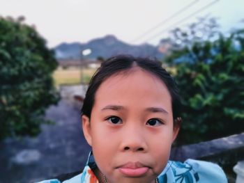 Close-up portrait of girl outdoors