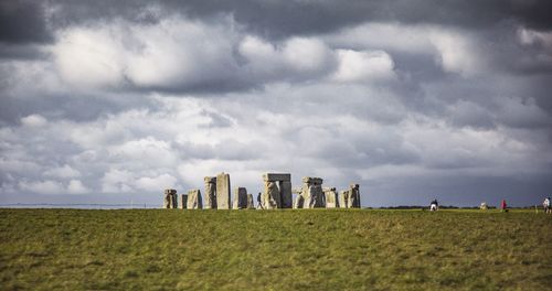 Panoramic view of landscape against cloudy sky