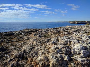 Scenic view of sea against blue sky