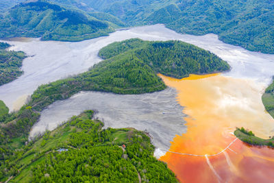 Aerial view of a big waste decanting lake. rosia poieni copper pit flooding the village of geamana