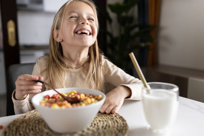 Portrait of woman having food