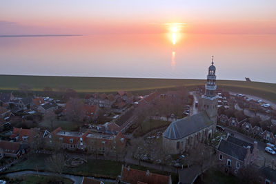 High angle view of townscape against sky during sunset