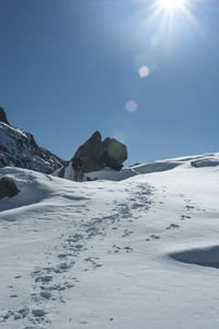 Scenic view of snowcapped mountain against sky