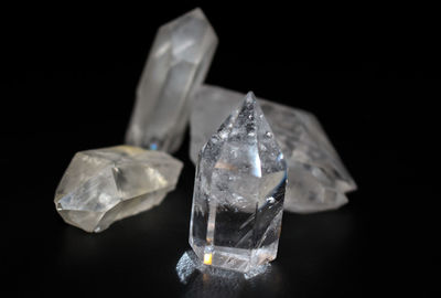 Close-up of quartz crystals on black background