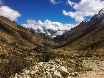 Scenic view of landscape and mountains against sky