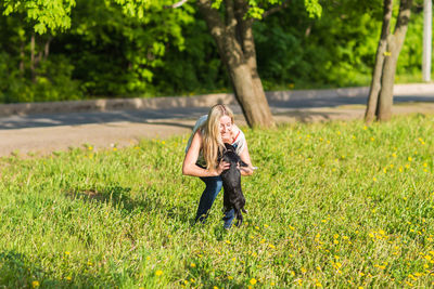 Full length of woman on field