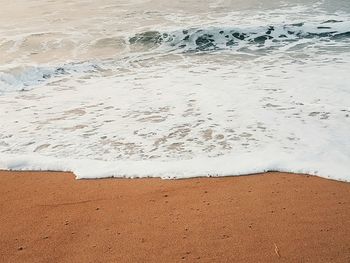 Text on sand at beach