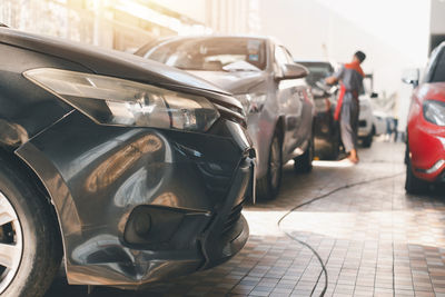 Close-up of car on street