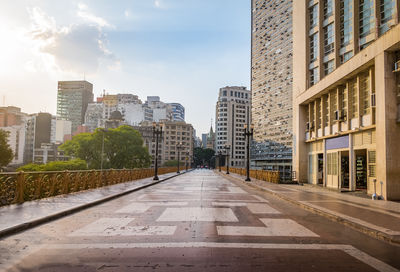 Buildings in city against sky